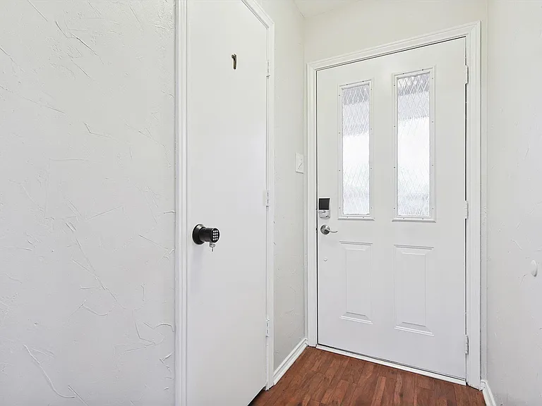 Additional locked closet for room 1 outside of room.
