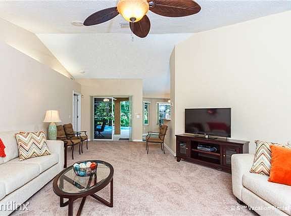 Our beautifully furnished living room with huge HDTV