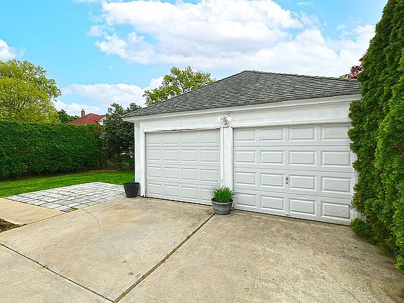 Garage and 2 spaces