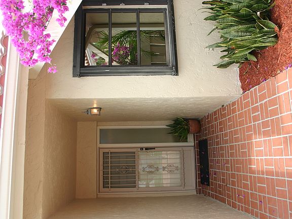 front door & 2nd BR window