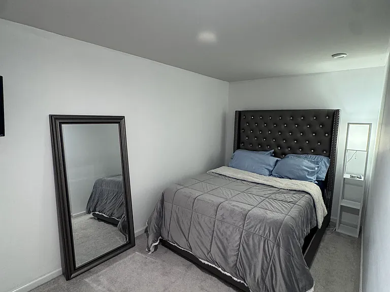 Furnished bedroom.