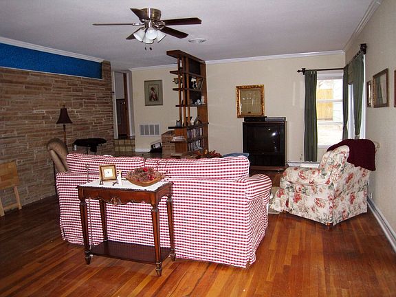 Living area with original hardwood floors
