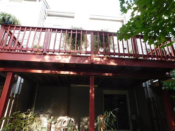 Spacious deck backs to trees & the creek.