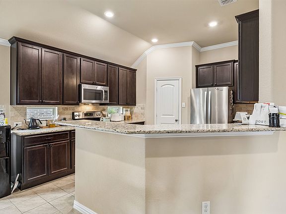 5th image of 11408 Aquilla Dr