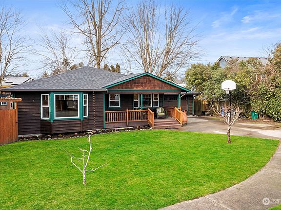 Hard to find 1910 square  foot rambler is situated on private, fenced lot>