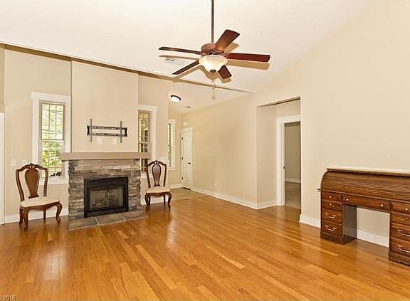 Fireplace with windows on either side