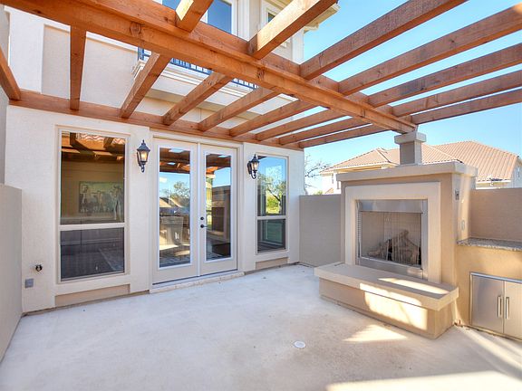 Pergola Front Patio with Fireplace