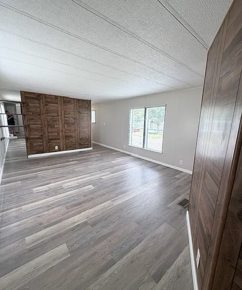 Living room with beautiful wood accent walls