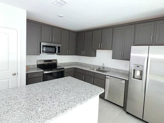 4th image of 1602 Fan Palm Dr