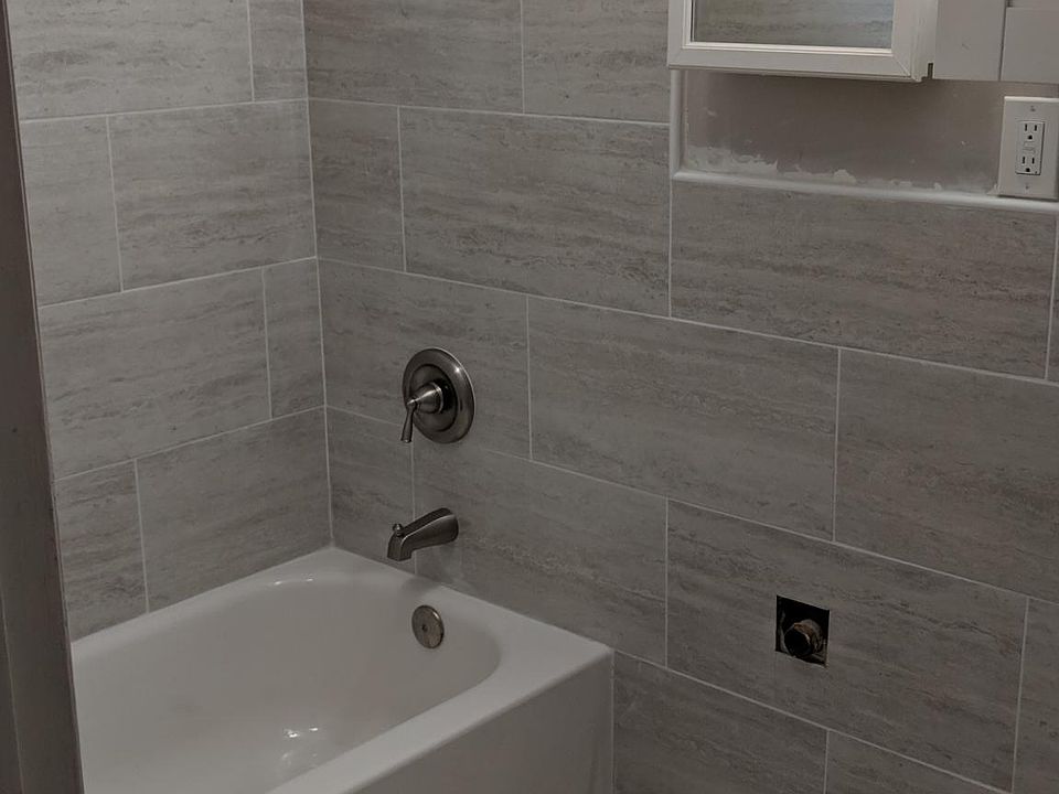 Beautiful new bathroom. Sink and toilet, and well as finishing touches are now complete (picture taken prior to remodel completion).