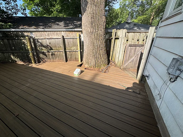 New deck behind garage