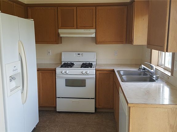 Clean kitchen with new flooring.