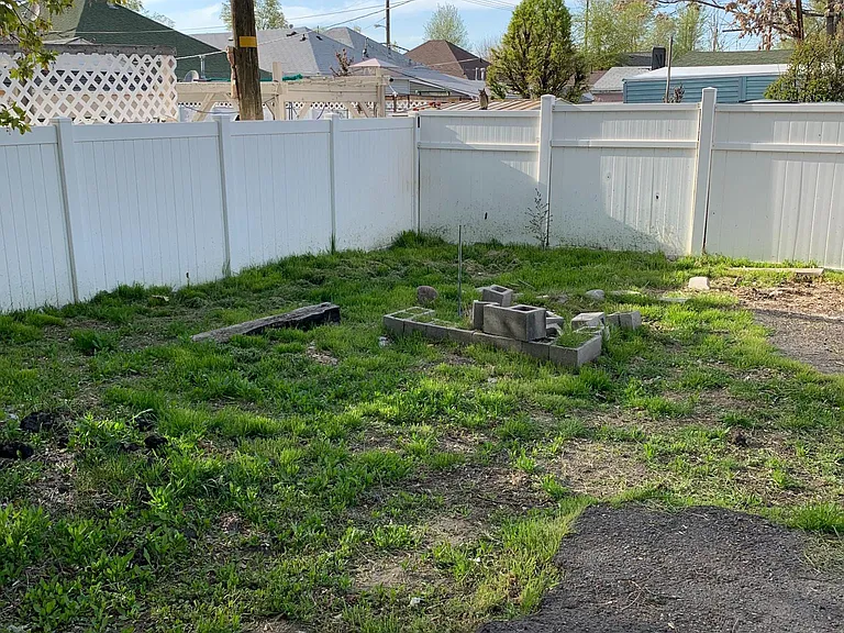 Large shady fully fenced back yard