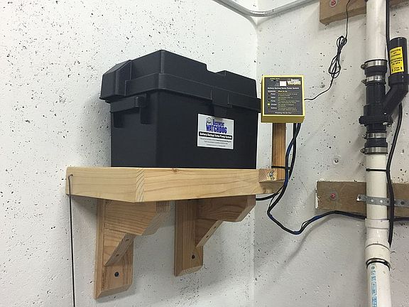 Elevated sump battery