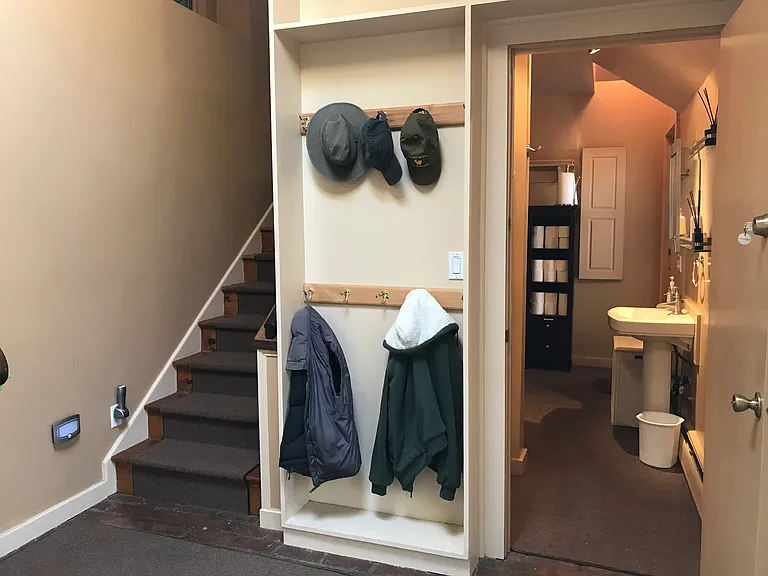 Entry level, stairs to upper level , bathroom/ laundry