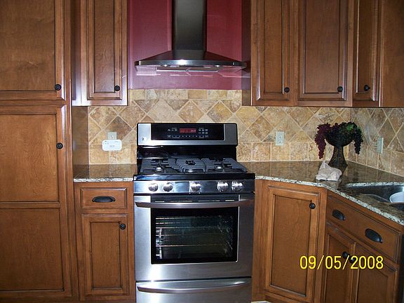 maple cabinets, granite countertops, all new stainless steel appliances