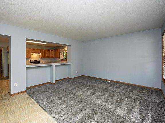 The living room is ready for your big TV and cozy furniture and will quickly become your sanctuary of relaxation! Imagine gathering with your people for some much needed rest and relaxation in this lovely space!