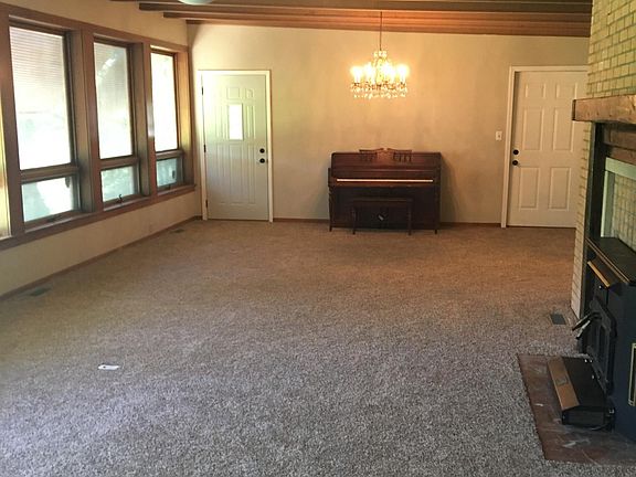 Living room looking into dining room space