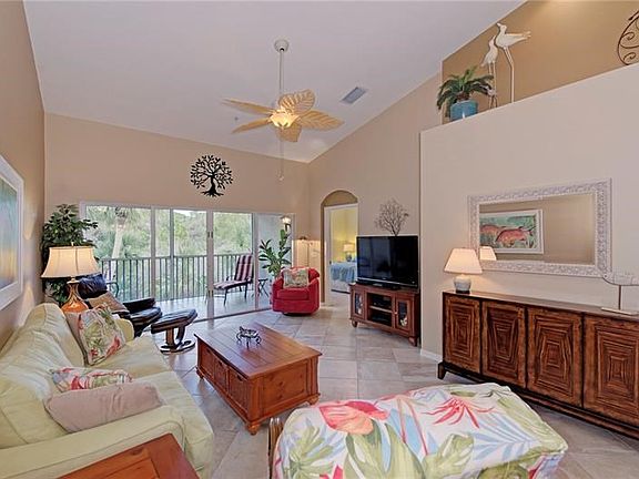 Living room, lanai and peak to master bedroom