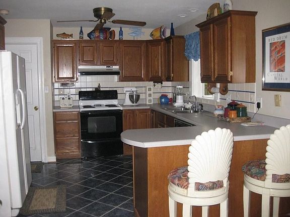 Kitchen with eat in bar