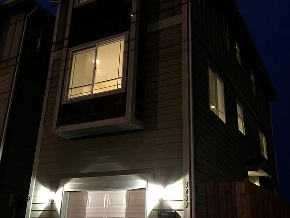 View of home at night. Must see the inside to appreciate how spacious and bright home is.
