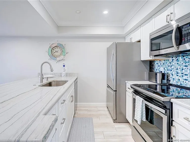 5602 NE Gulfstream Way — Photo 11