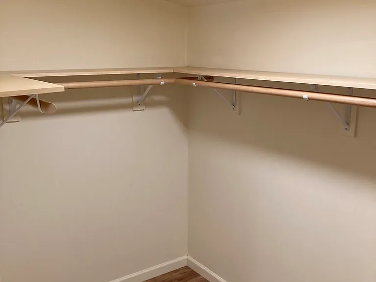 Master bedroom on the main level with walk in closet.