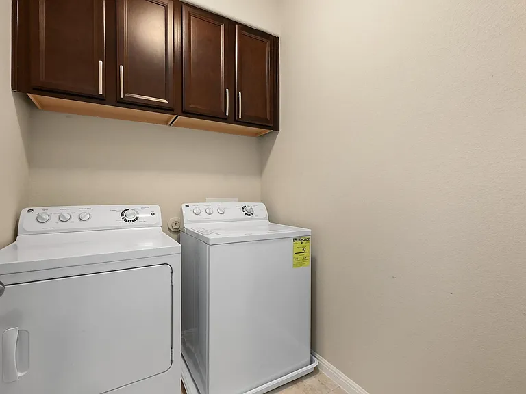 In unit washer and dryer upstairs.