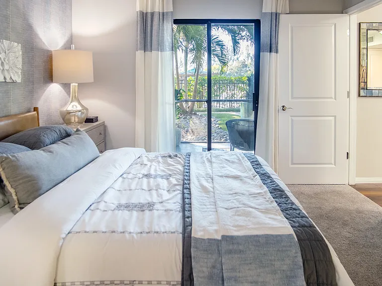 Enjoy private access to the screened-in lanai from the exclusive Riviera master bedroom.