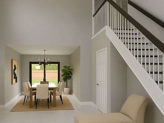 High ceilings and a bright room great. Living and dining room. Half bath side door. Stairs the all bedrooms.