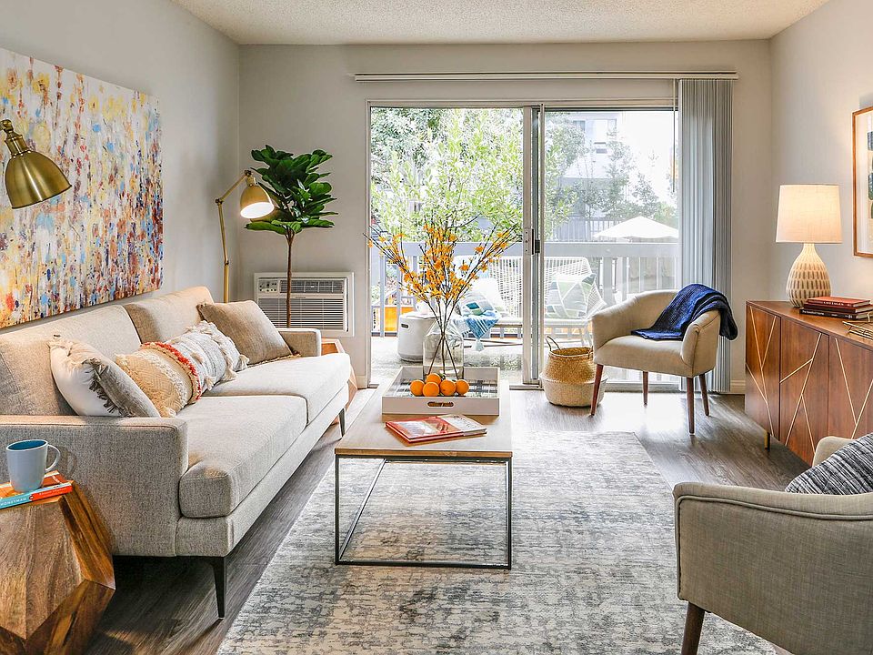 Condo-style, spacious living room with large balcony