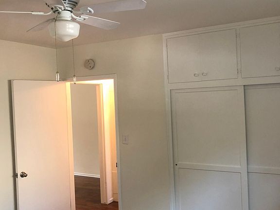 Bedroom and closet with storage