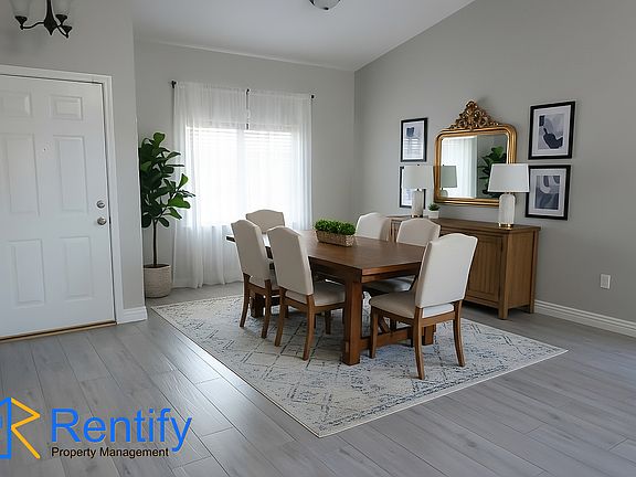 Dining area with help from ai staging.