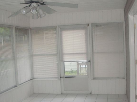 Glass enclosed porch 10 x 20