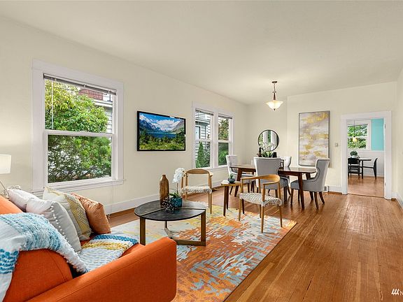 Picture rail, high ceilings, wood-wrapped windows, a variety of vintage hardware and memorable architecture. 