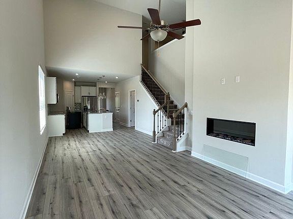 Living room with elevated ceiling.