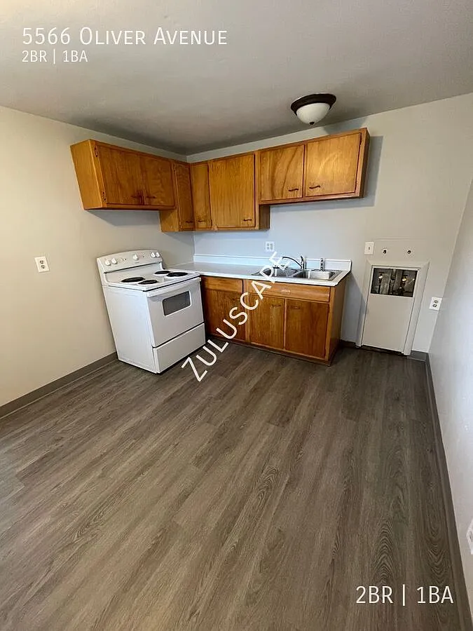 5566 Oliver Ave. / 2 bed 1 bath duplex with fenced yard — Photo 4