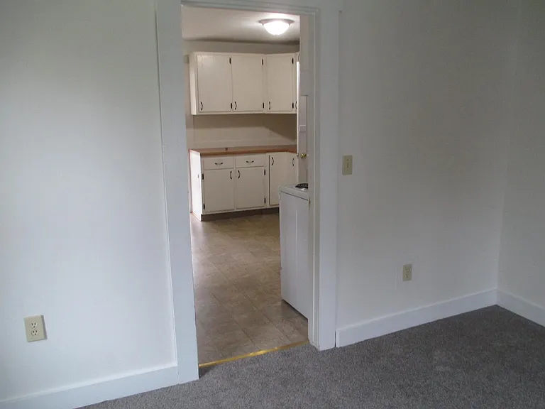 Third bedroom looking to kitchen