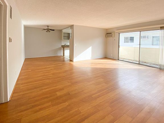 Spacious and sunny with A/C and ceiling fan in dining alcove.