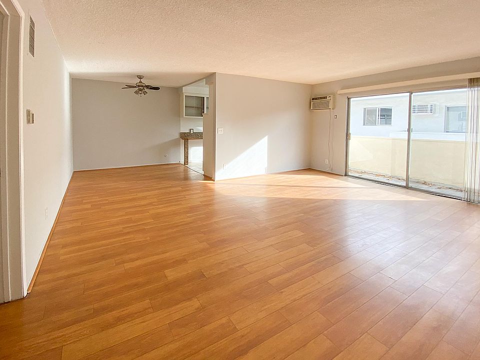 Spacious and sunny with A/C and ceiling fan in dining alcove.