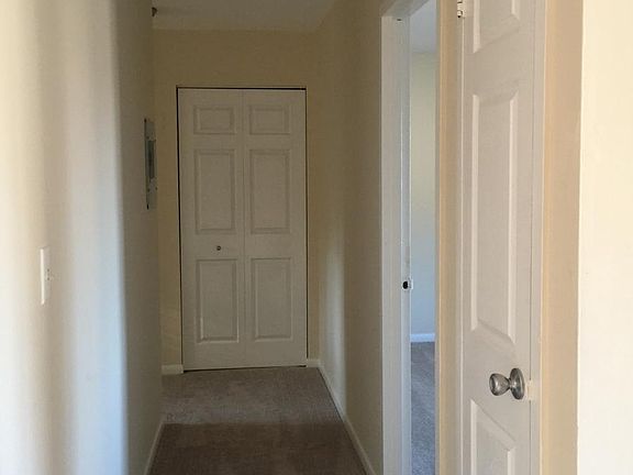 hallway to bedroom and bathroom
