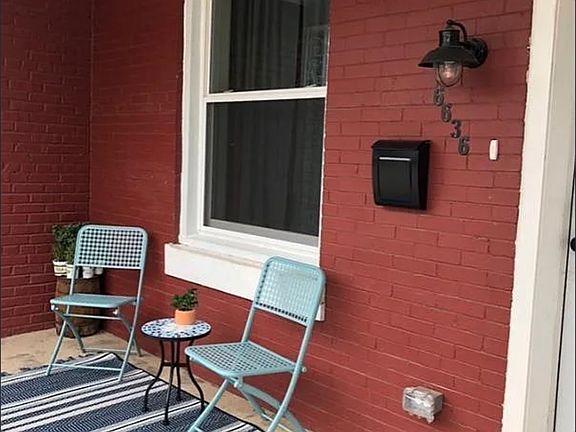 Cheerful front porch potential