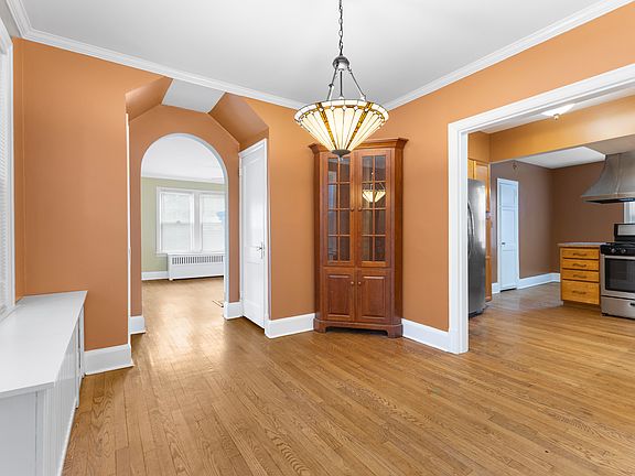 A warm welcome inside, showcasing the beautiful built-ins and character of the home.