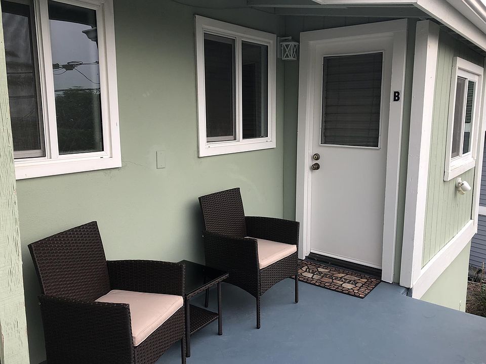 Entry door and entry deck. Peek of ocean and Dana Point views from the deck