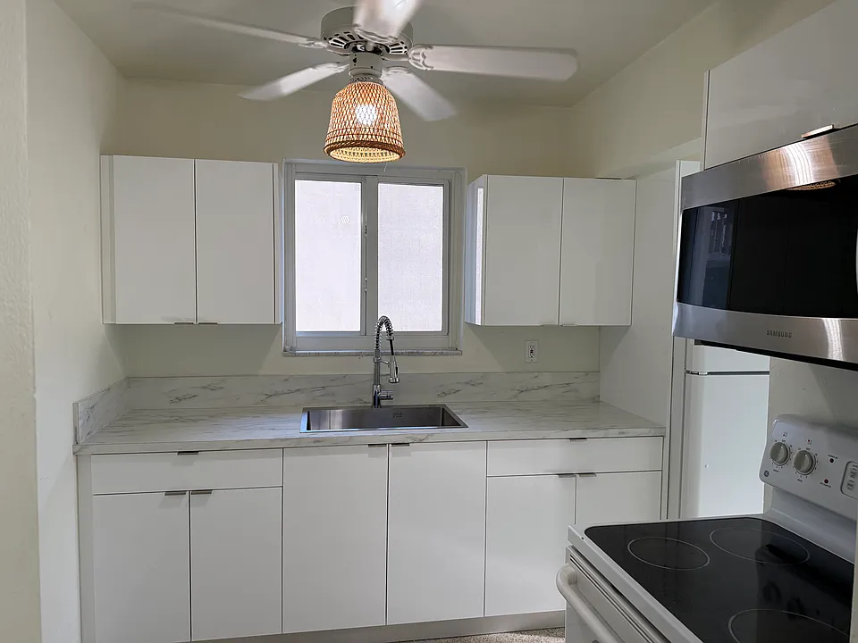 Newly Renovated Kitchen with Refrigerator, Stove w/Oven and Microwave Oven