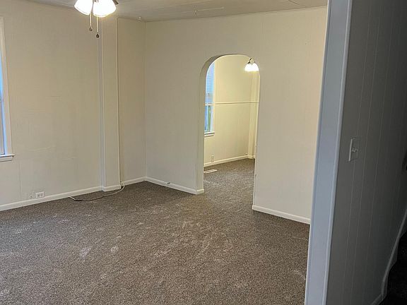 View from entryway into living room and stairs