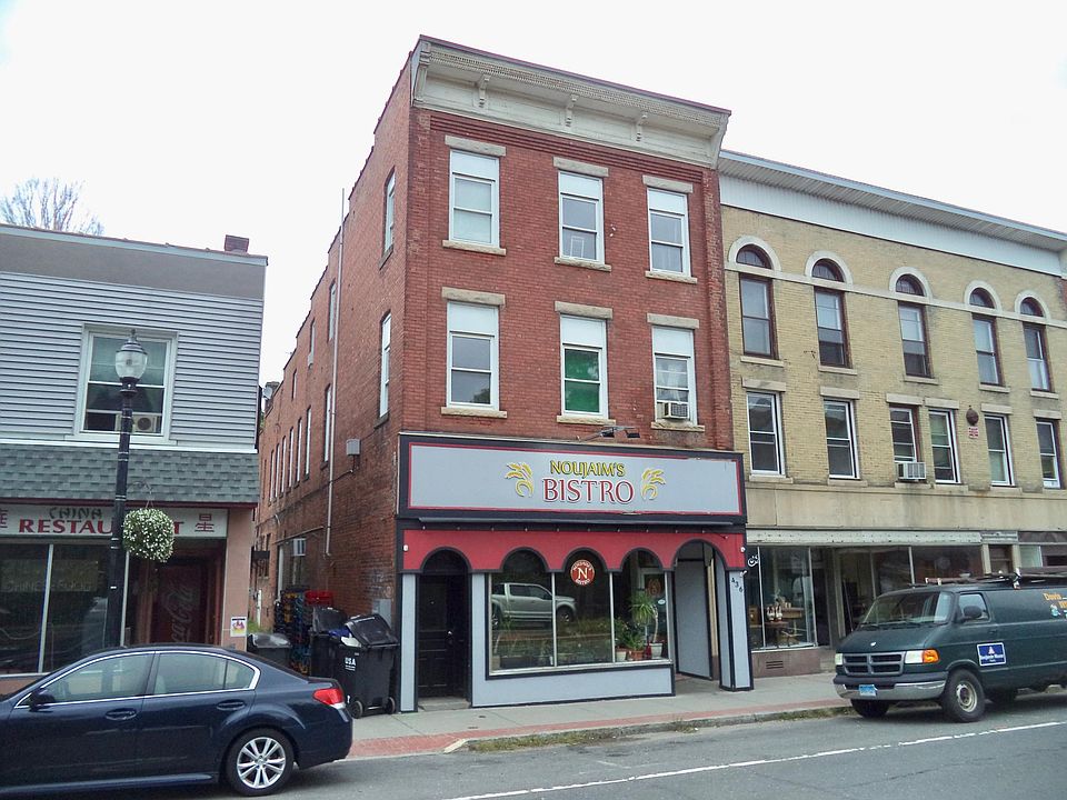 438 Main Street, Winsted. Apartment has the 3 top floor windows facing Main Street.