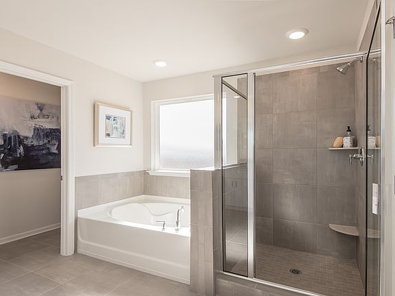 Pamper yourself in the spa-inspired bathroom.