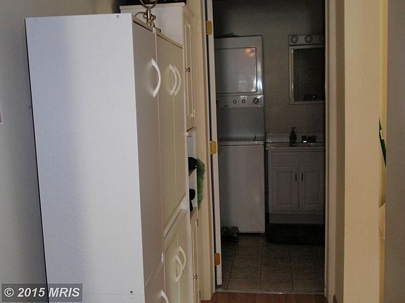 From kitchen into main level bath with W/D