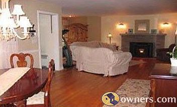 Dining Room to Living Room Showing Grand Fireplace
